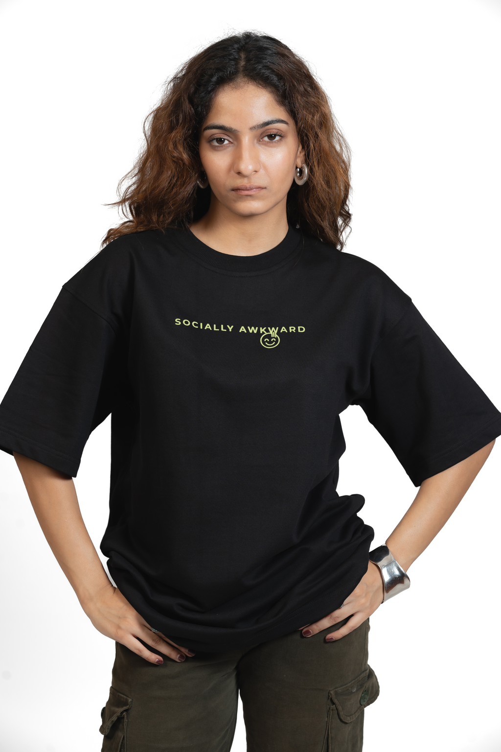 Woman wearing a black t-shirt with 'SOCIALLY AWKWARD' text in yellow on a white background